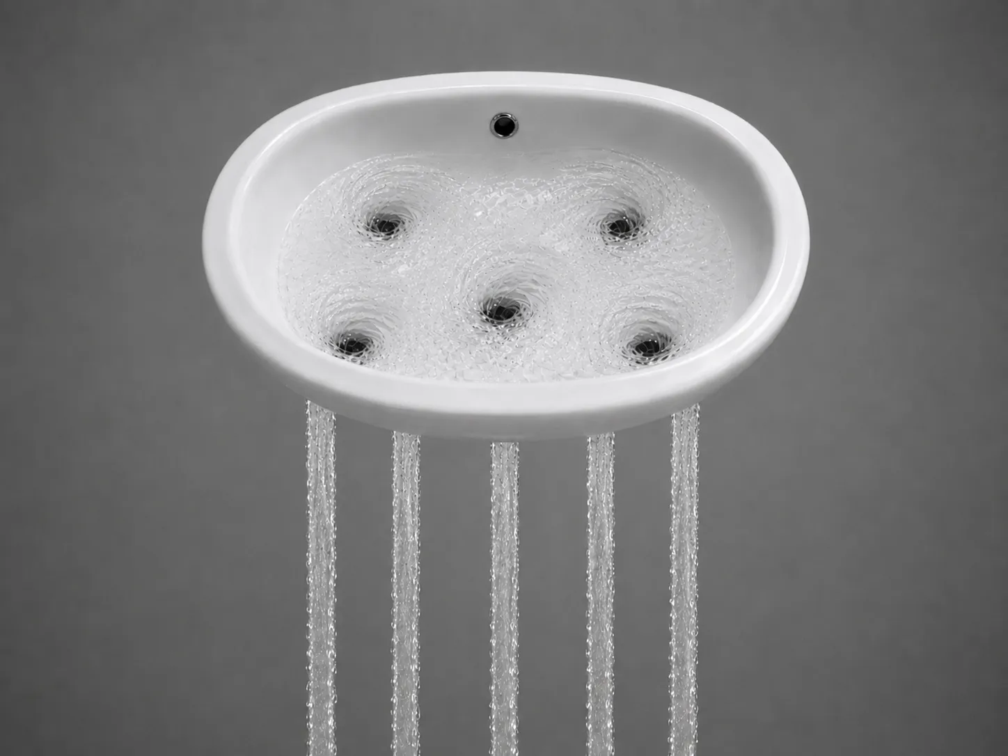 A sink with five drains wide open